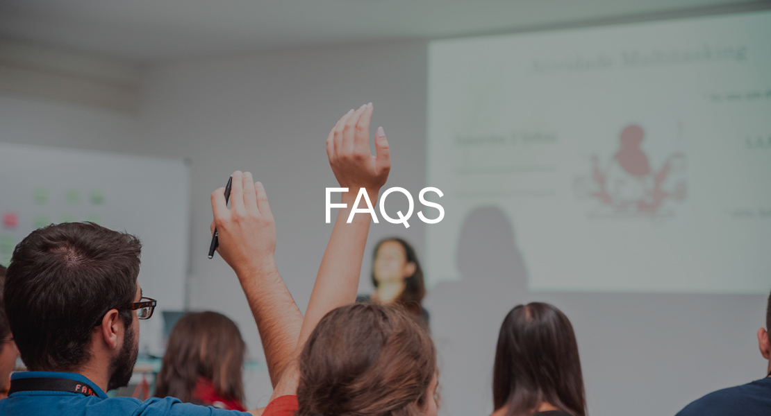 People raising hands to ask questions